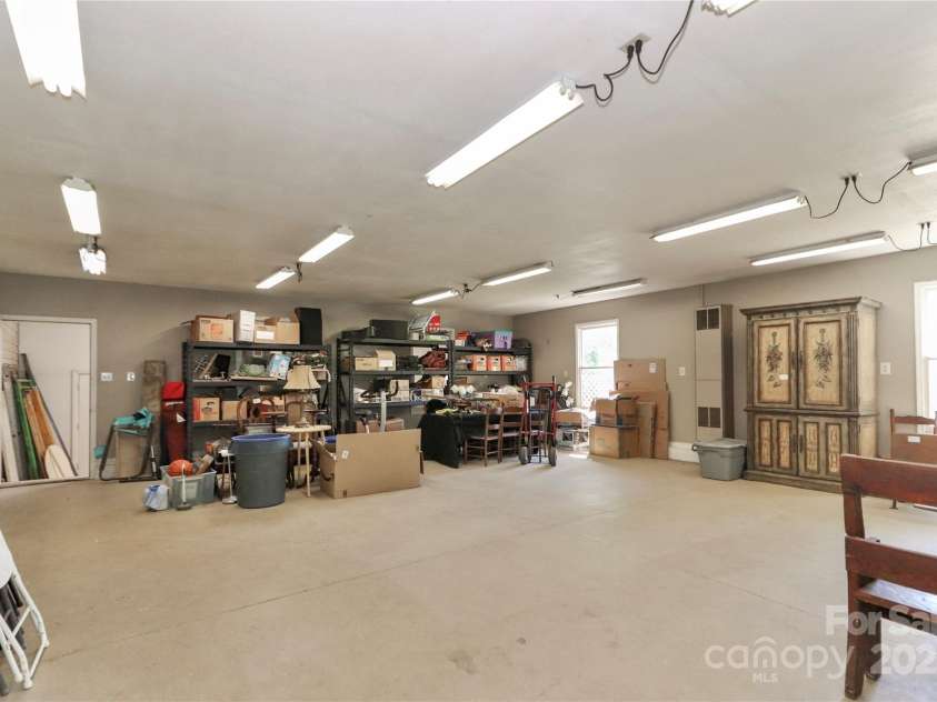 235 Walnut Street, Statesville, NC 28677.  MLS# CAR4134450, YatesRealty ID 418. Large Heated Square Footage with Full Bath in the back of the detached garage.