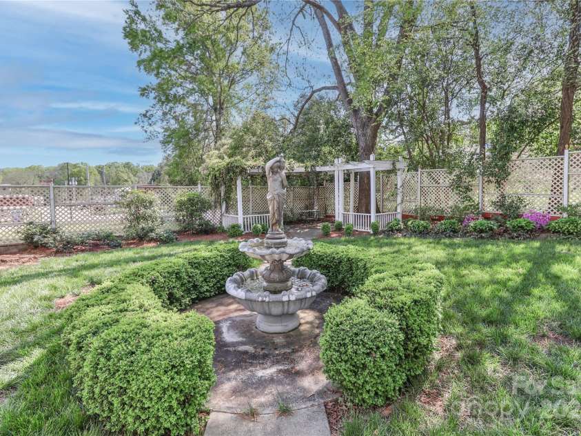 235 Walnut Street, Statesville, NC 28677.  MLS# CAR4134450, YatesRealty ID 418. Private Backyard/Santuary