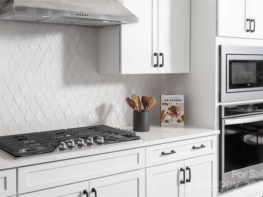 5321 Mint Harbor Way, Charlotte, NC 28269.  MLS# CAR4304757, YatesRealty ID 4180. Photo not of actual home- Kitchen