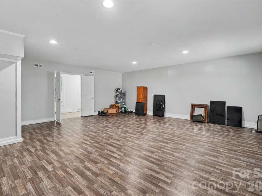 502 Cedarwood Drive, Monroe, NC 28112.  MLS# CAR4405782, YatesRealty ID 41817. Large Entertainment Room/Flex Room on Main Level