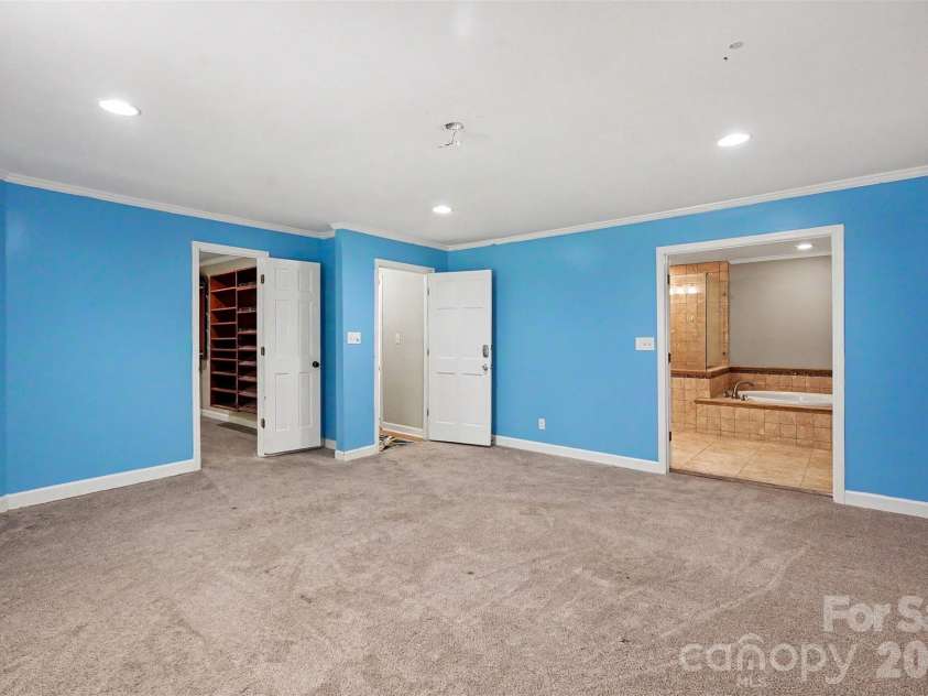 502 Cedarwood Drive, Monroe, NC 28112.  MLS# CAR4405782, YatesRealty ID 41817. Spacious Primary Bedroom