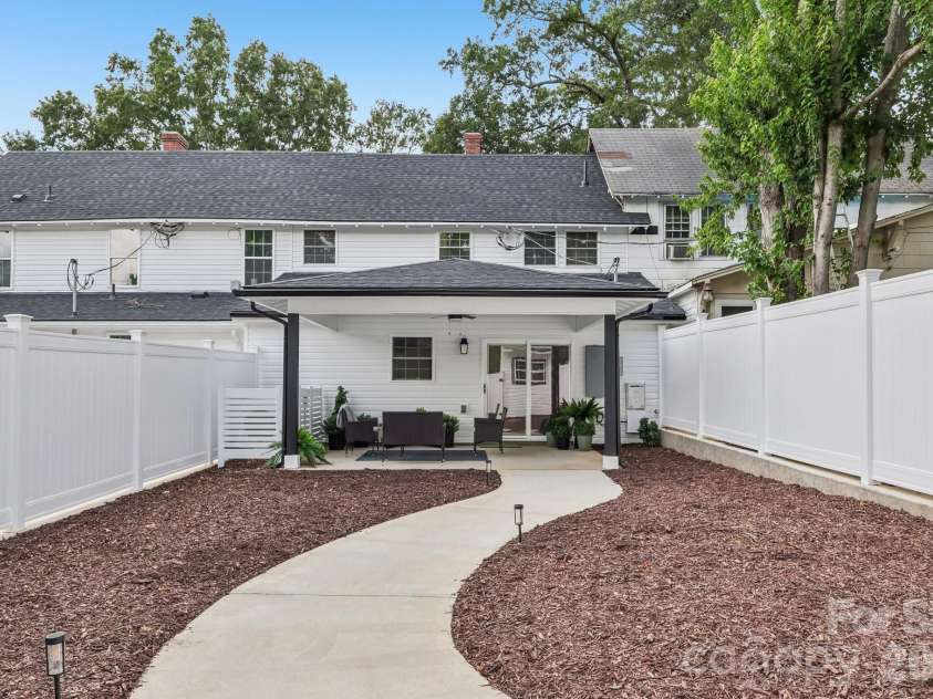 105 Maple Street, Badin, NC 28009.  MLS# CAR4409947, YatesRealty ID 41821. Backyard