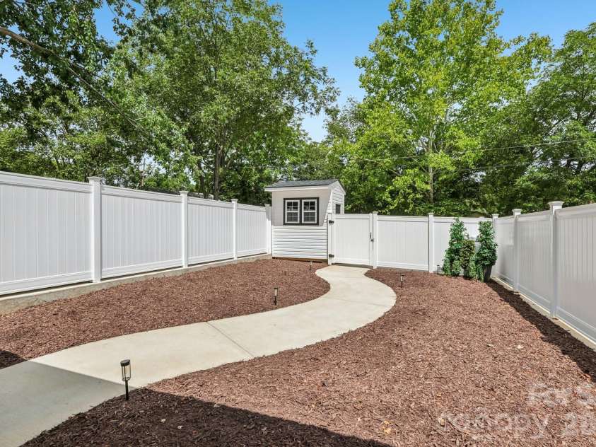 105 Maple Street, Badin, NC 28009.  MLS# CAR4409947, YatesRealty ID 41821. Backyard