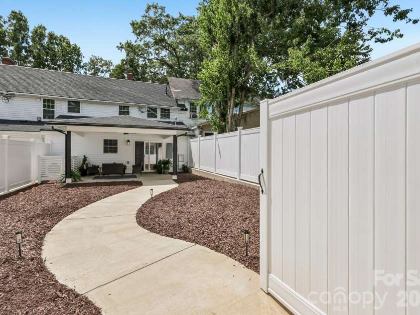105 Maple Street, Badin, NC 28009.  MLS# CAR4409947, YatesRealty ID 41821. Backyard