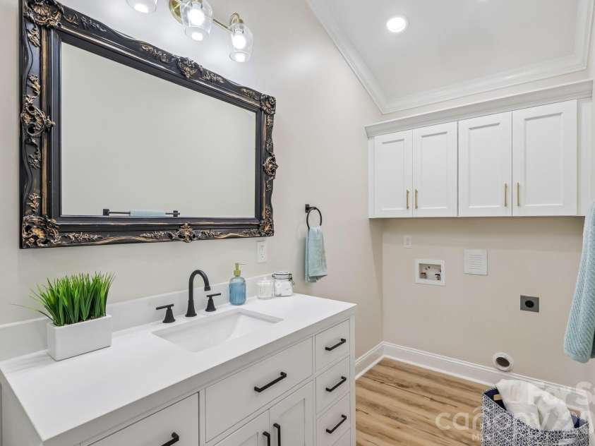 105 Maple Street, Badin, NC 28009.  MLS# CAR4409947, YatesRealty ID 41821. Bathroom/Laundry Main Level