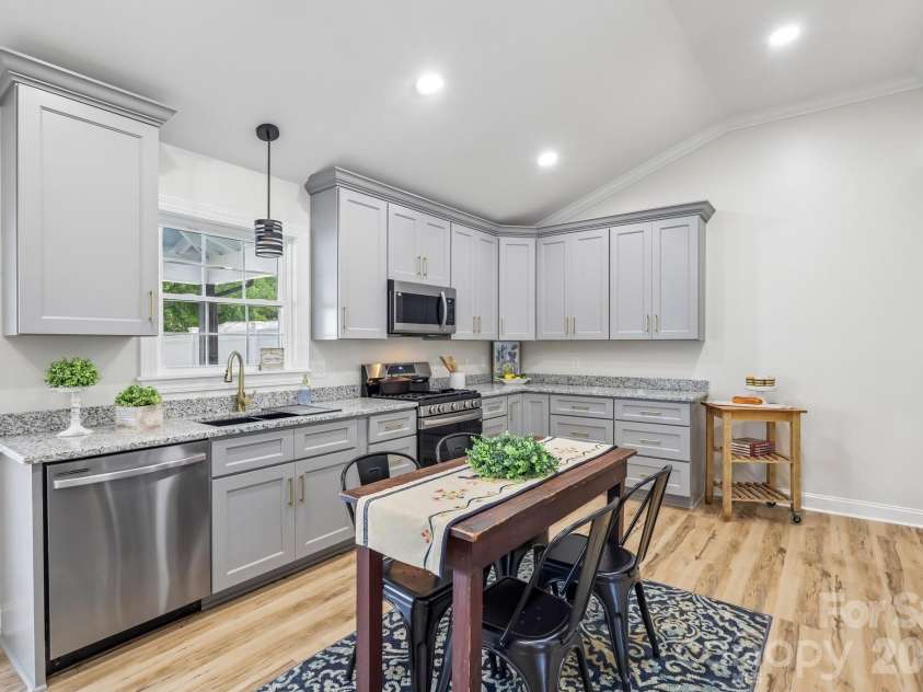 105 Maple Street, Badin, NC 28009.  MLS# CAR4409947, YatesRealty ID 41821. Kitchen