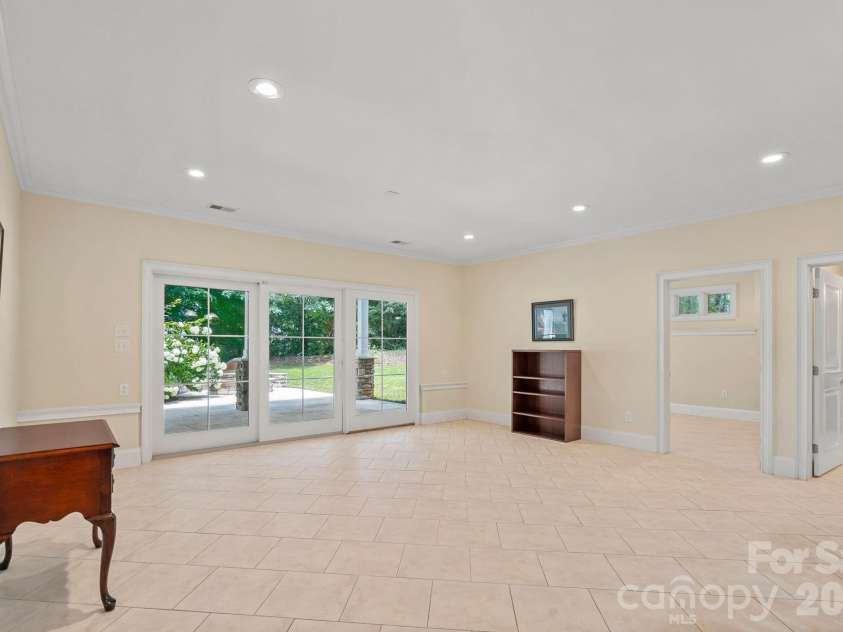 7967 Glen Abbey Circle, Stanley, NC 28164.  MLS# CAR4409089, YatesRealty ID 41832. Basement Living Room