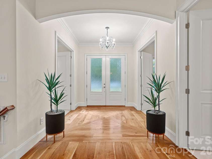 7967 Glen Abbey Circle, Stanley, NC 28164.  MLS# CAR4409089, YatesRealty ID 41832. Grand Foyer Solid Cherry Wood Floors