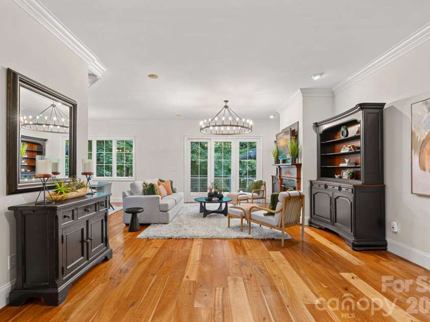7967 Glen Abbey Circle, Stanley, NC 28164.  MLS# CAR4409089, YatesRealty ID 41832. Open Living Room...Those Floors!