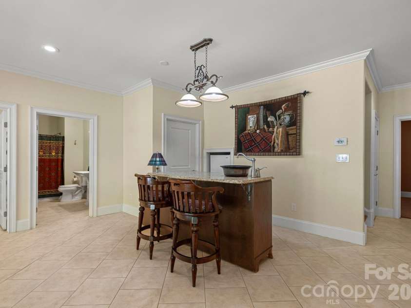 7967 Glen Abbey Circle, Stanley, NC 28164.  MLS# CAR4409089, YatesRealty ID 41832. The Bar!