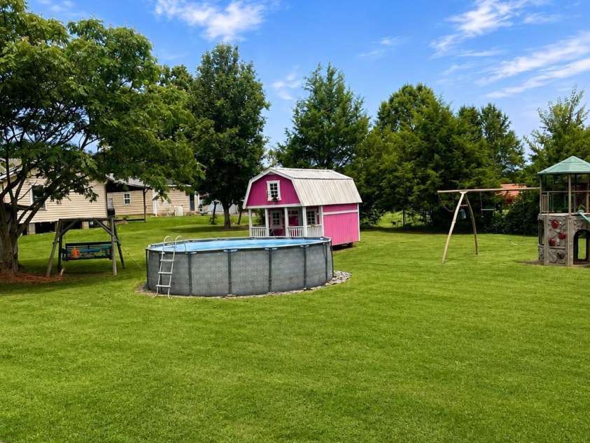 534 Browns Hill Road, Locust, NC 28097.  MLS# CAR4410937, YatesRealty ID 41835. Backyard View2