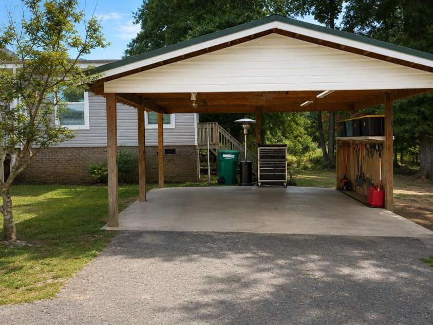 534 Browns Hill Road, Locust, NC 28097.  MLS# CAR4410937, YatesRealty ID 41835. Carport