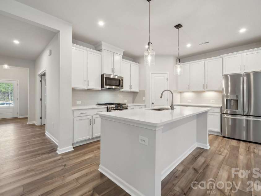 3021 Shaver Ridge Lane, Charlotte, NC 28215.  MLS# CAR4409395, YatesRealty ID 41837. Example Photo