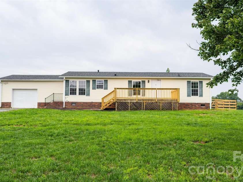 135 Howell Road, Mocksville, NC 27028.  MLS# CAR4405945, YatesRealty ID 41843. 