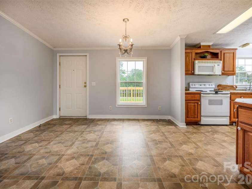 135 Howell Road, Mocksville, NC 27028.  MLS# CAR4405945, YatesRealty ID 41843. 