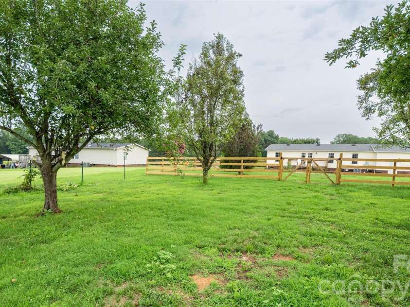 135 Howell Road, Mocksville, NC 27028.  MLS# CAR4405945, YatesRealty ID 41843. 