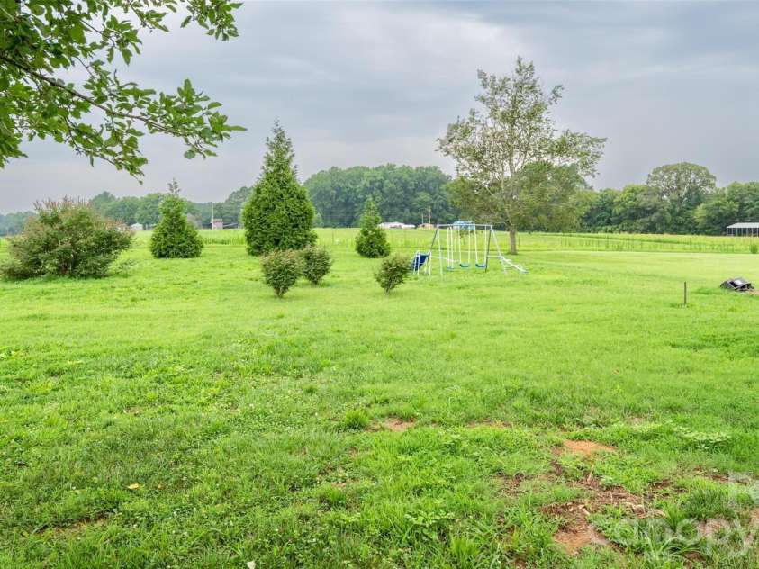 135 Howell Road, Mocksville, NC 27028.  MLS# CAR4405945, YatesRealty ID 41843. 