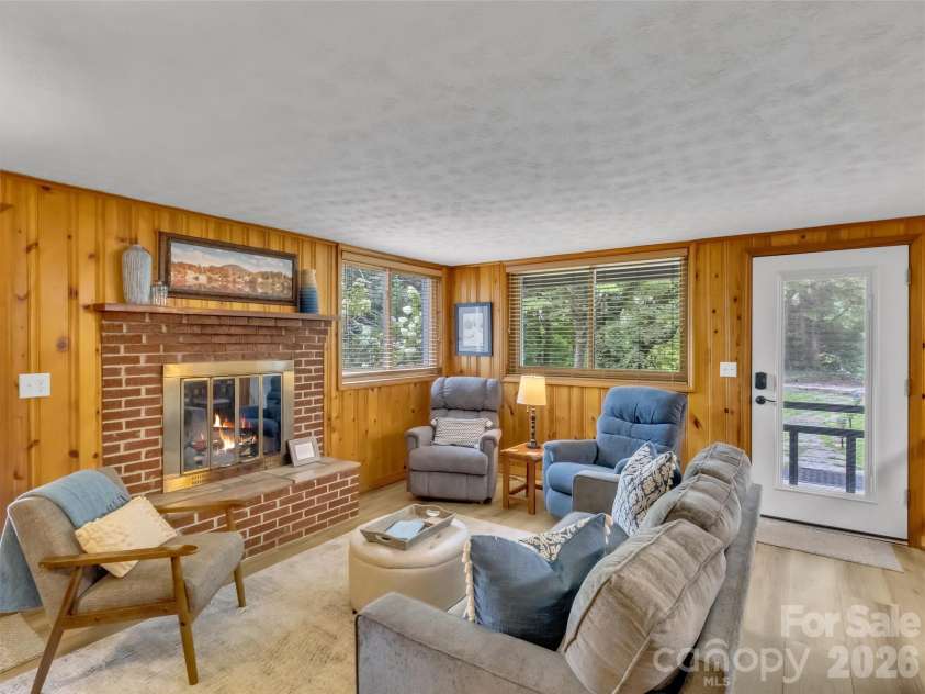 87 Glenview Road, Lake Junaluska, NC 28745.  MLS# CAR4411765, YatesRealty ID 41862. Lower Great Room