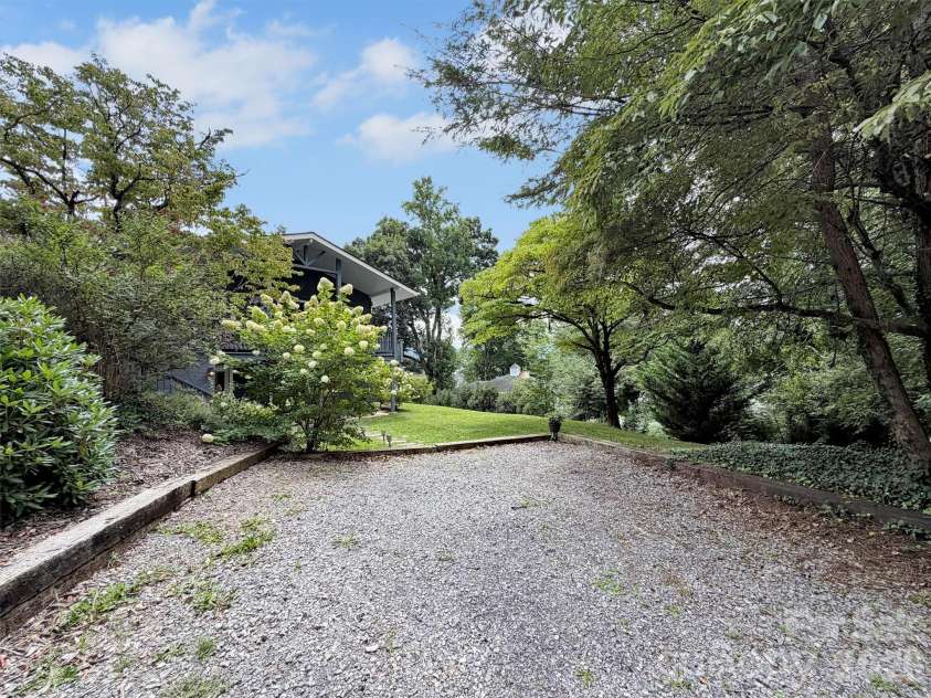 87 Glenview Road, Lake Junaluska, NC 28745.  MLS# CAR4411765, YatesRealty ID 41862. Lower level has its own parking