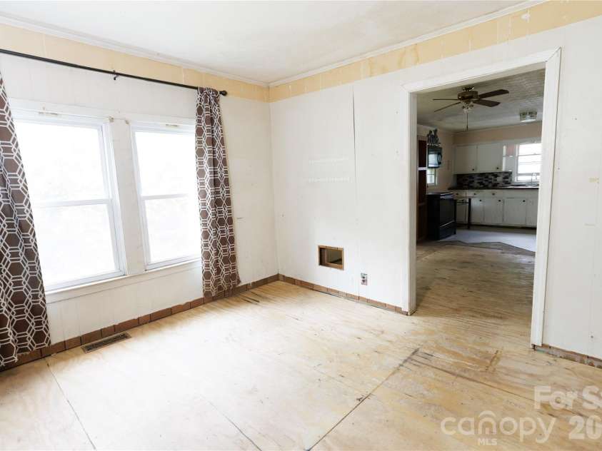 329 Finley Avenue, Lenoir, NC 28645.  MLS# CAR4409548, YatesRealty ID 41864. Flex room area leading to kitchen