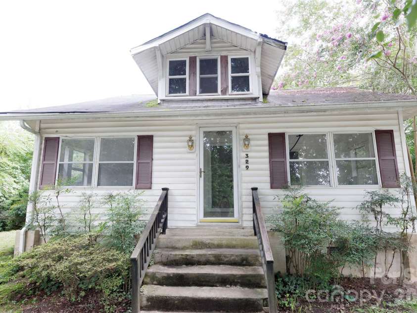 329 Finley Avenue, Lenoir, NC 28645.  MLS# CAR4409548, YatesRealty ID 41864. Front of  home
