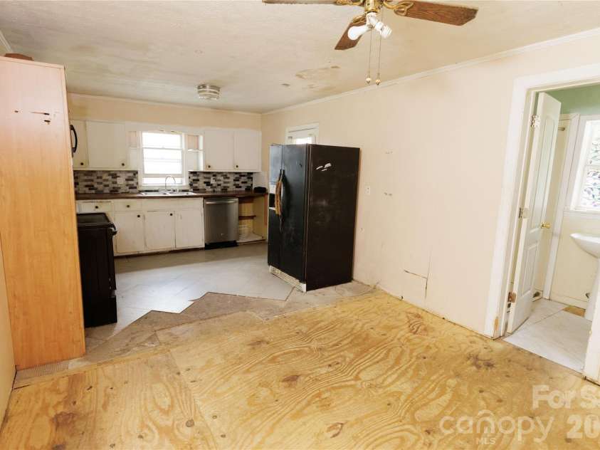 329 Finley Avenue, Lenoir, NC 28645.  MLS# CAR4409548, YatesRealty ID 41864. Kitchen and large dining area