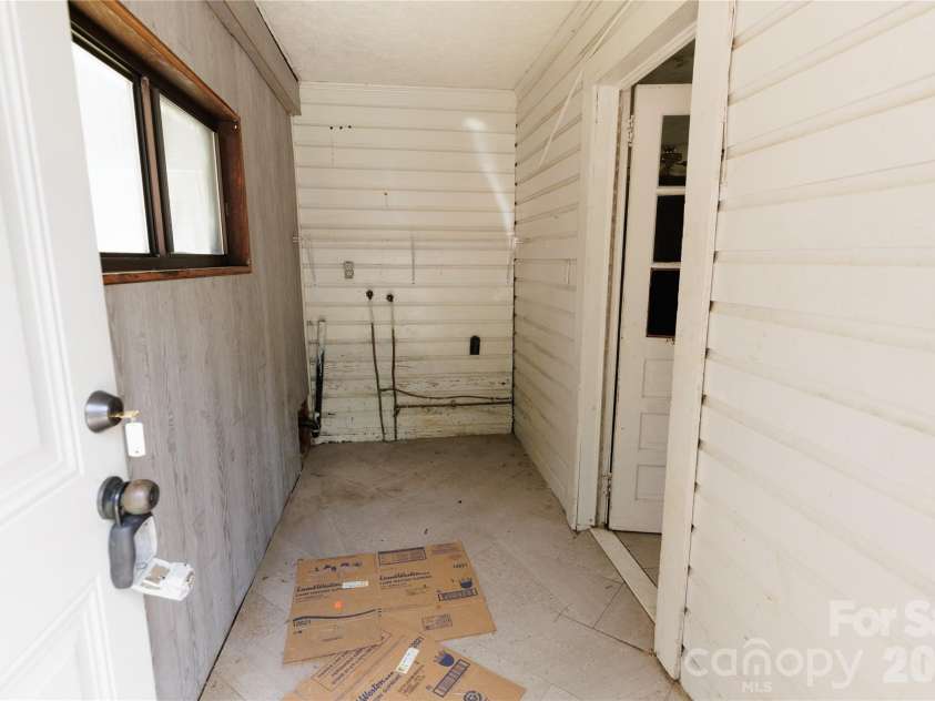 329 Finley Avenue, Lenoir, NC 28645.  MLS# CAR4409548, YatesRealty ID 41864. Mudroom/laundry area, not heated