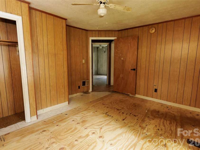 329 Finley Avenue, Lenoir, NC 28645.  MLS# CAR4409548, YatesRealty ID 41864. Primary bedroom toward hall