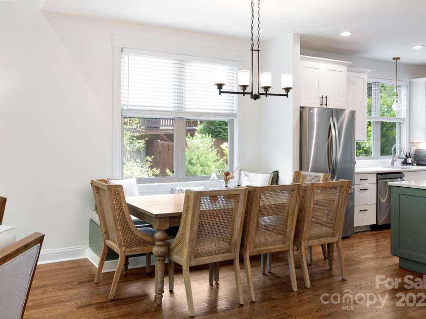 11 Elkmont Drive, Asheville, NC 28804.  MLS# CAR4284783, YatesRealty ID 41869. Dining area has built in window seat