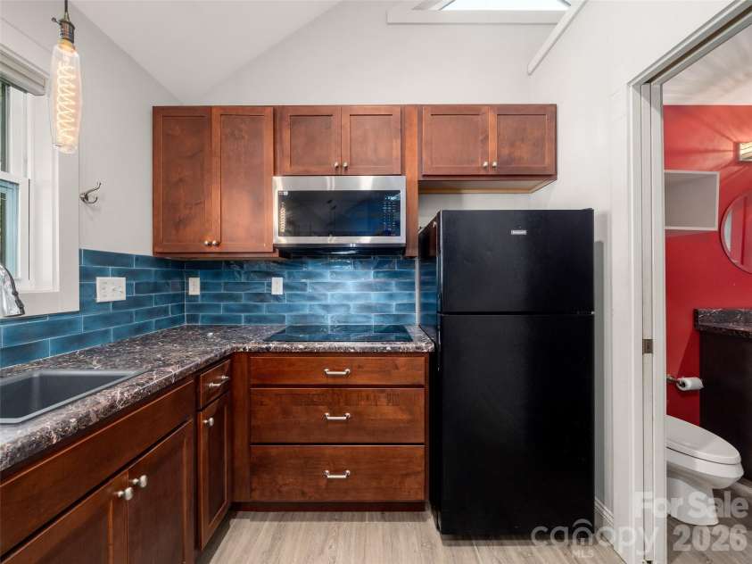 185 Duckworth Avenue, Brevard, NC 28712.  MLS# CAR4411616, YatesRealty ID 41874. 