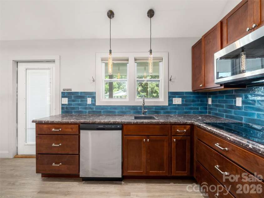 185 Duckworth Avenue, Brevard, NC 28712.  MLS# CAR4411616, YatesRealty ID 41874. 