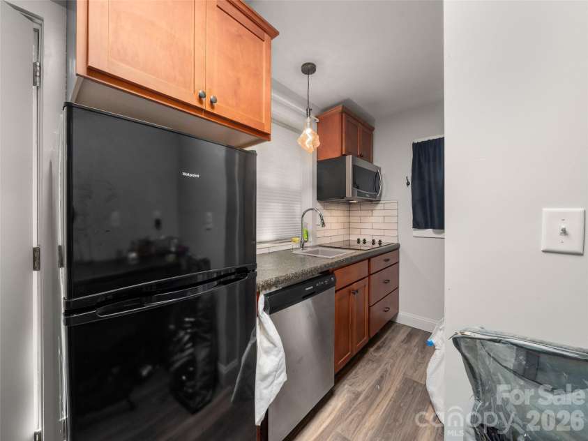 185 Duckworth Avenue, Brevard, NC 28712.  MLS# CAR4411616, YatesRealty ID 41874. 