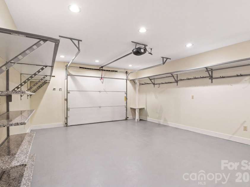26 Macallan Lane, Asheville, NC 28805.  MLS# CAR4401347, YatesRealty ID 41888. Attached garage with convenient ground-level access.