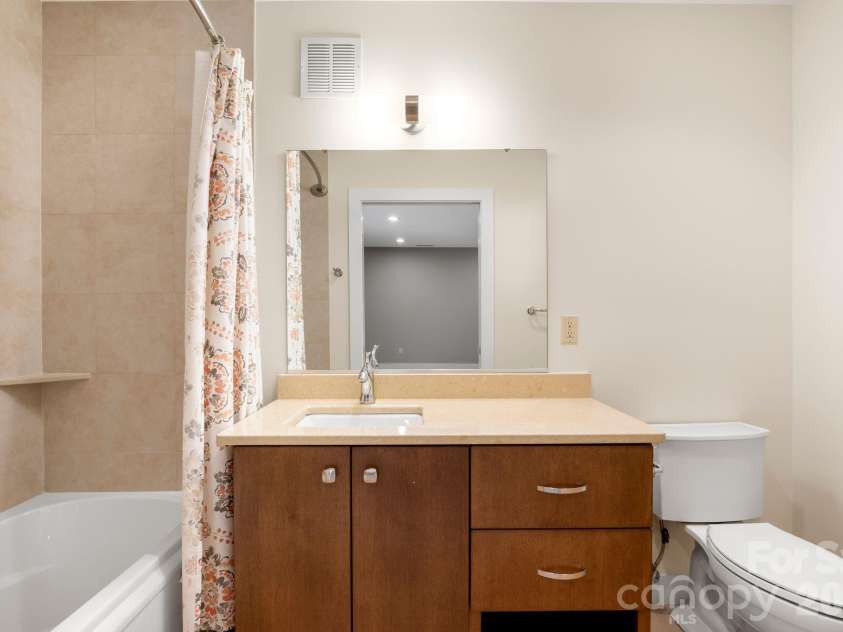 26 Macallan Lane, Asheville, NC 28805.  MLS# CAR4401347, YatesRealty ID 41888. Lower/ground level bathroom.