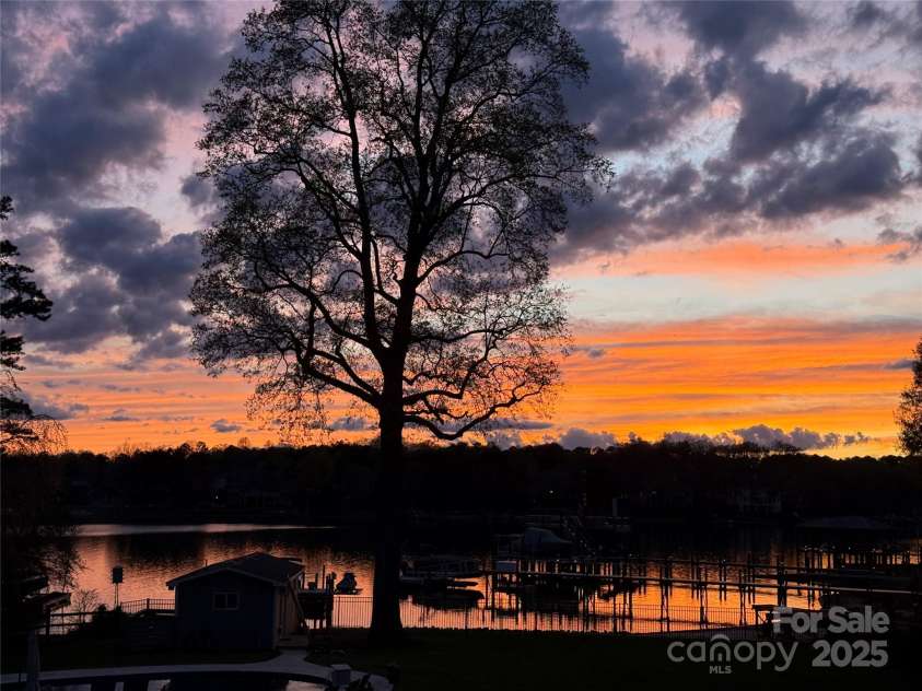 106 Beachview Drive, Mooresville, NC 28117.  MLS# CAR4228983, YatesRealty ID 4189. Breathtaking Sunsets