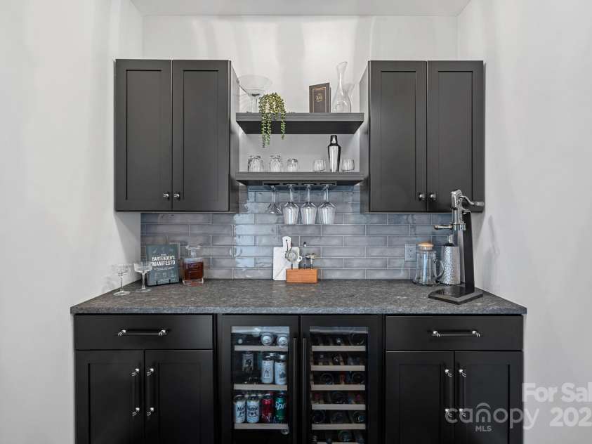 106 Beachview Drive, Mooresville, NC 28117.  MLS# CAR4228983, YatesRealty ID 4189. Built in Bar with Wine and Beer Fridge