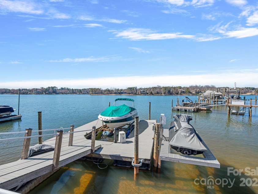 106 Beachview Drive, Mooresville, NC 28117.  MLS# CAR4228983, YatesRealty ID 4189. Dock with Boat Slip and 2 Jet Ski Lifts