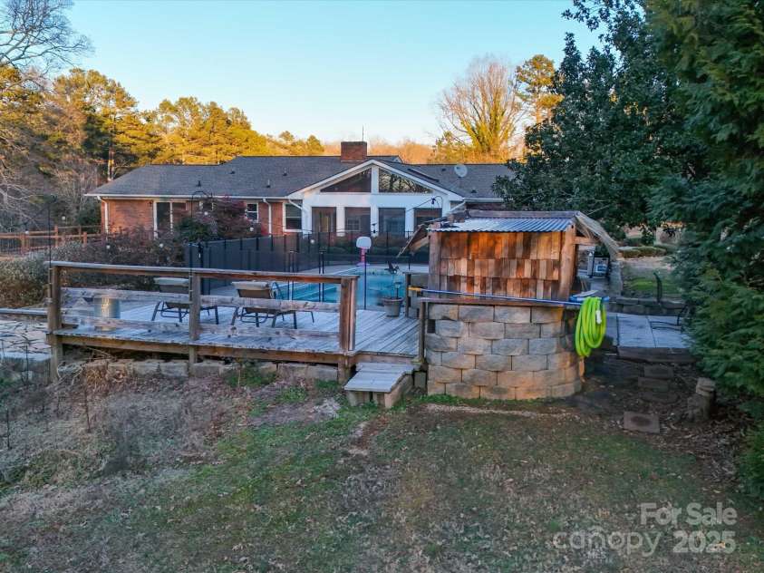 44101 Millingport Road, Richfield, NC 28137.  MLS# CAR4213972, YatesRealty ID 419. Back view of pool and deck