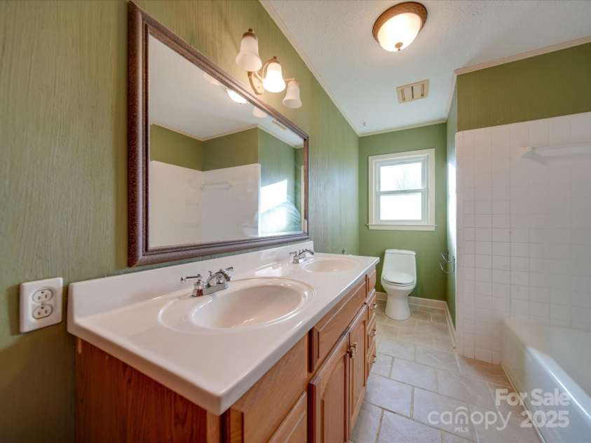 44101 Millingport Road, Richfield, NC 28137.  MLS# CAR4213972, YatesRealty ID 419. Guest bathroom