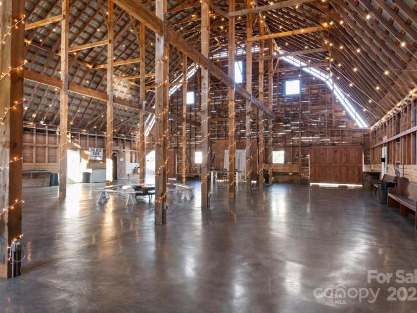 732 Crowe Dairy Road, Forest City, NC 28043.  MLS# CAR4234052, YatesRealty ID 419. Barn has been updated for event space and includes two bathrooms.