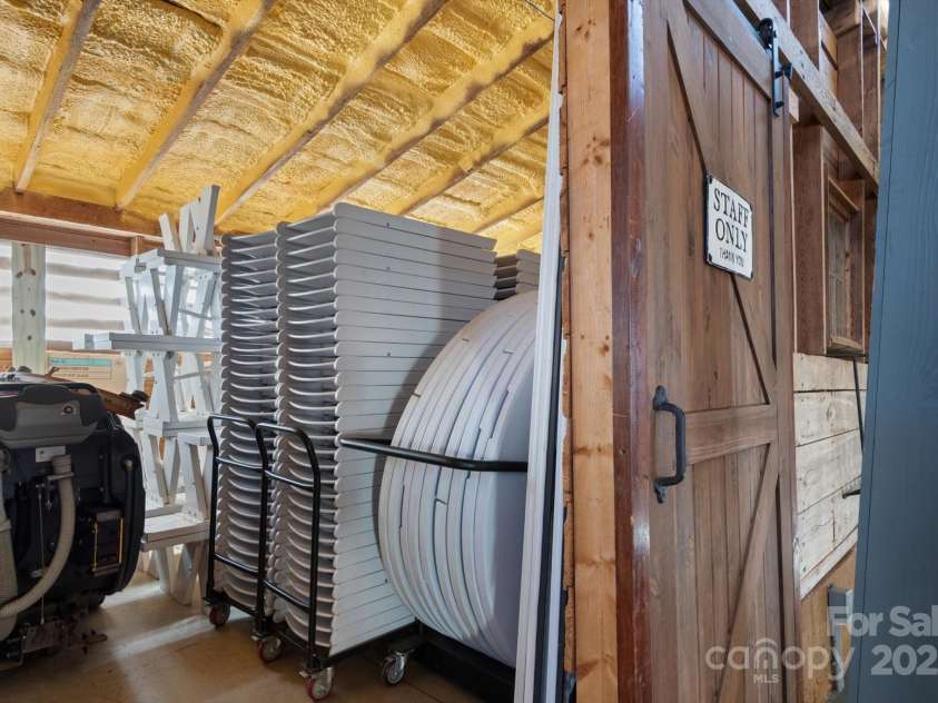 732 Crowe Dairy Road, Forest City, NC 28043.  MLS# CAR4234052, YatesRealty ID 419. Floor cleaning machine plus tables and chairs.