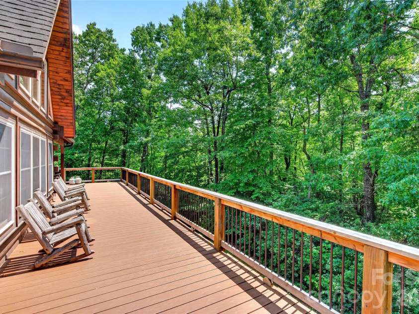 1767 Catawba Falls Parkway, Black Mountain, NC 28711.  MLS# CAR4411768, YatesRealty ID 41900. Main level back deck