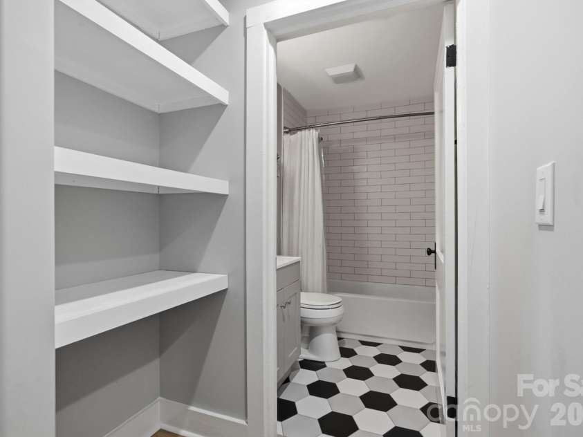 1103 Mable Avenue, Kannapolis, NC 28083.  MLS# CAR4402555, YatesRealty ID 41902. Custom-built shelves! Bathroom #2