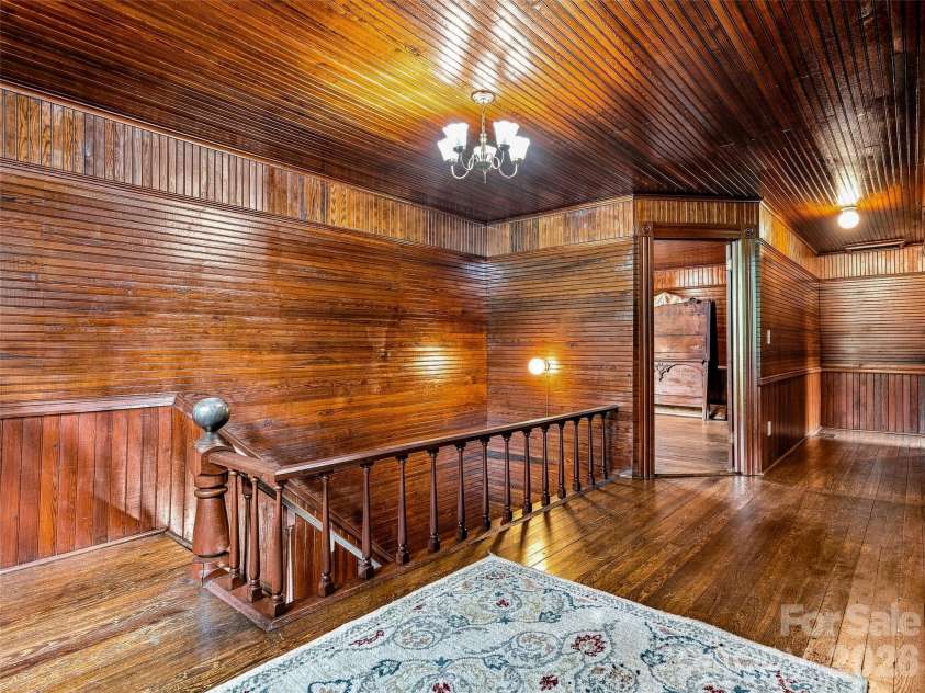 5 Clarks Cove Road, Leicester, NC 28748.  MLS# CAR4411750, YatesRealty ID 41911. Open stringer staircase