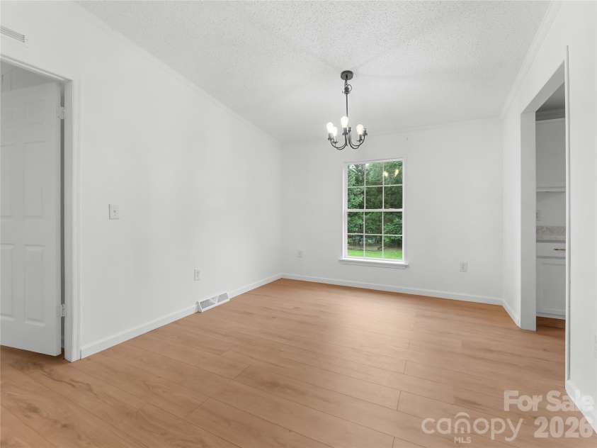 398 Staton Road, Flat Rock, NC 28731.  MLS# CAR4404515, YatesRealty ID 41912. Dining area