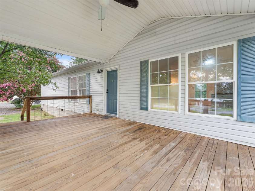 398 Staton Road, Flat Rock, NC 28731.  MLS# CAR4404515, YatesRealty ID 41912. Front porch