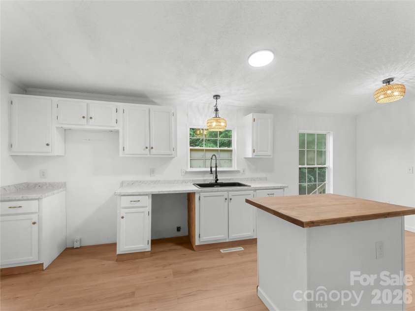 398 Staton Road, Flat Rock, NC 28731.  MLS# CAR4404515, YatesRealty ID 41912. Kitchen
