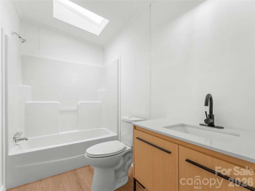 398 Staton Road, Flat Rock, NC 28731.  MLS# CAR4404515, YatesRealty ID 41912. Second Bath off of second bedroom