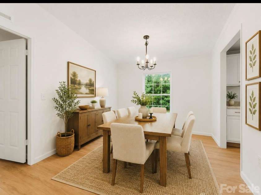 398 Staton Road, Flat Rock, NC 28731.  MLS# CAR4404515, YatesRealty ID 41912. Virtually staged dining area