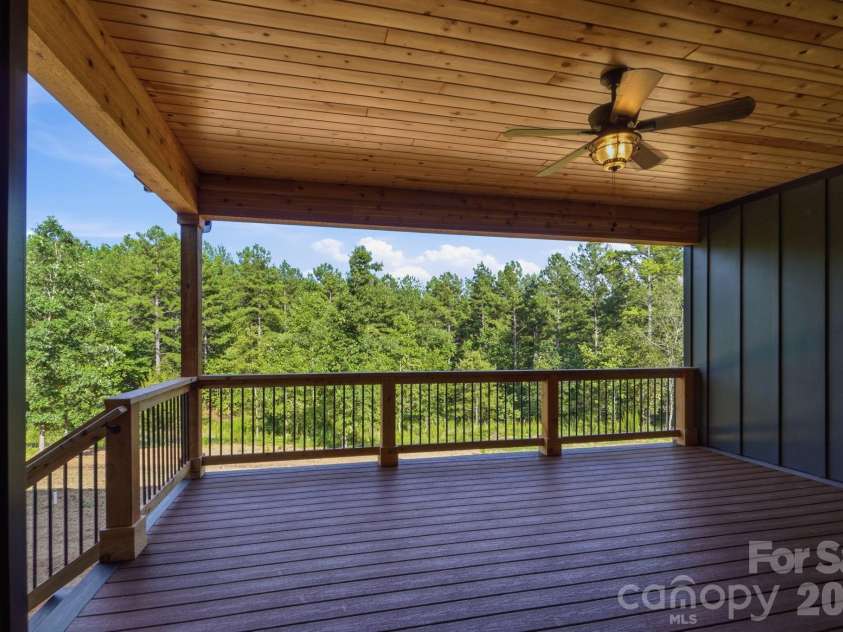 5529 Paddock Way, Granite Falls, NC 28630.  MLS# CAR4404325, YatesRealty ID 41913. Back Deck with solid cedar posts, cedar wrapped beams & cedar deck railings
